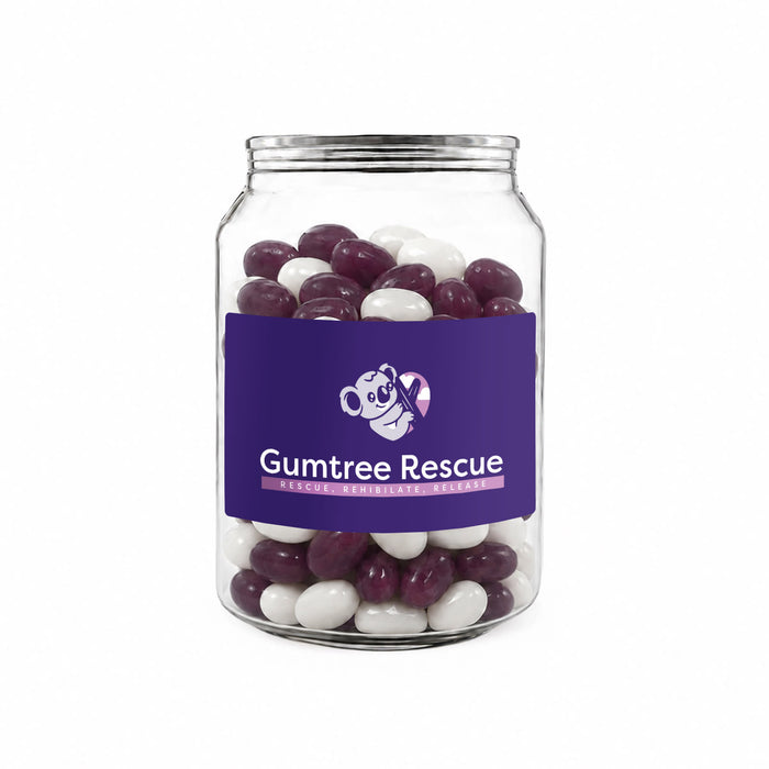 Corporate Colour Jelly Beans in Clear Can 210g - A clear jar filled with purple and white jelly beans, featuring a logo on the front.