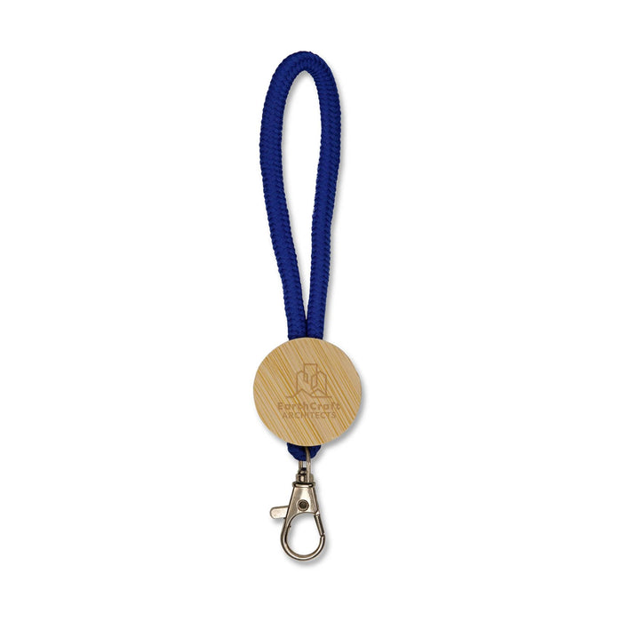 Luxeloop Keytag - A blue keytag featuring a bamboo circular attachment and a metal clip for easy fastening.