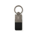 Mario Keytag - A keytag featuring a metal and black leather design, with a circular keyring and a logo.