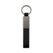 Zander Keytag - A black keytag featuring a flat rectangular metal section and a circular attachment ring.