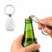 Moby Keytag - A silver keytag bottle opener being used to open a green glass bottle. The opener has a simple, sleek design.