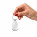 Moby Keytag - A hand holds a silver Moby Keytag with a smooth, teardrop shape and a circular keyring.