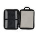 Vision Sports Towel - A zipped storage case featuring a mesh pocket and a padded compartment, primarily in black with a light grey interior.