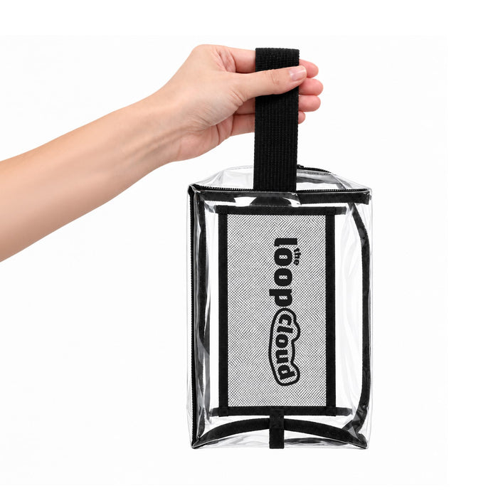Laynie Clear Cosmetic Bag - A clear cosmetic bag with a black handle and a branded logo, held by a hand.