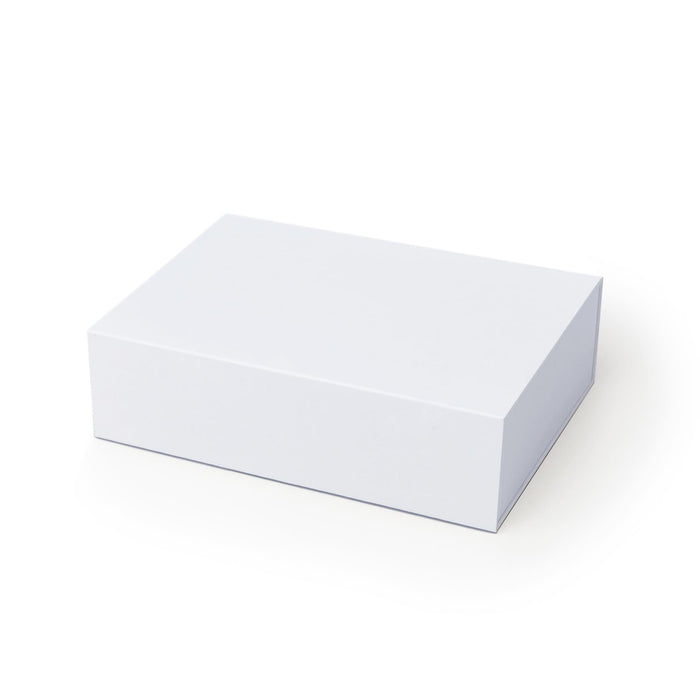 The Ultimate Welcome - Hot Chocolate Edition - A plain white box with a rectangular shape, featuring a smooth surface and no visible branding.