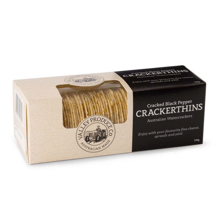 The Sunchaser Set - A box of Cracked Black Pepper Crackerthins featuring a stack of thin water crackers. The box has a logo and a beige colour scheme.