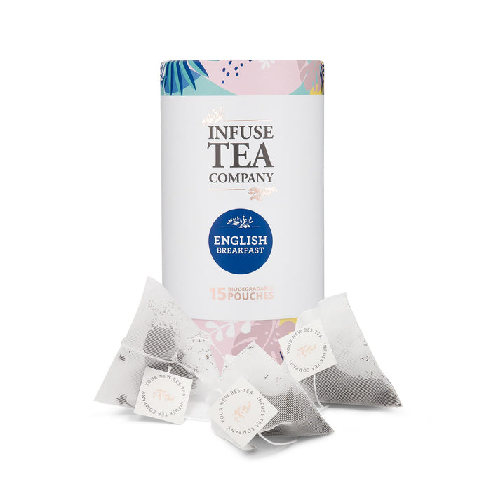 The Brew Ritual - A tea canister with a floral design, featuring English Breakfast tea pouches in white biodegradable bags.