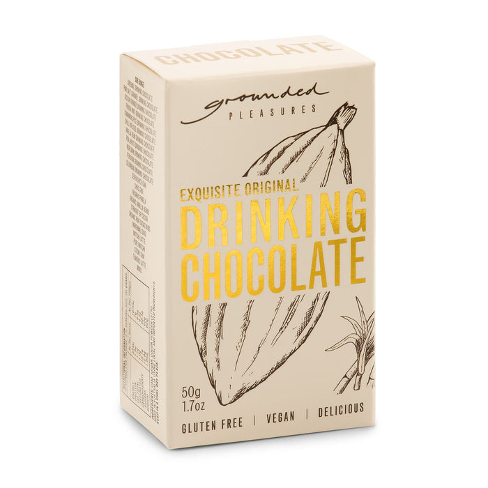 The Cosy Indulgence - A box of drinking chocolate in beige with a logo, featuring ingredients and gluten-free, vegan labels.