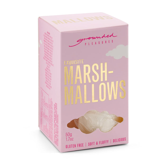 The Pause Pack: Christmas Edition - A pink box of marshmallows with a fluffy, soft texture. The box features a logo and highlights gluten-free content.