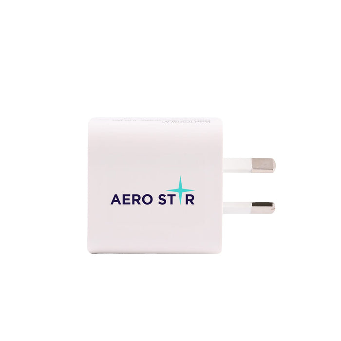 Tech Pack Executive - A white power adapter with two prongs, featuring a logo on its surface.
