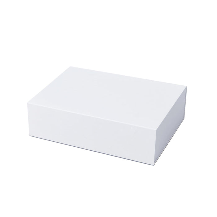 The Perfect Pairing: Christmas Edition - A rectangular white box with a smooth surface, suitable for packaging or storage.