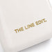 Pavilion Cooler by The Line Edit. - A cream cooler featuring a simple, sleek design with a gold logo.