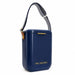 Pavilion Cooler by The Line Edit. - A navy blue cooler with a striped strap and a small logo. It has a sleek, rectangular design.