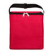 Daily Grind Pack - A red insulated bag with a zip closure and a front pocket, featuring a black strap on top.