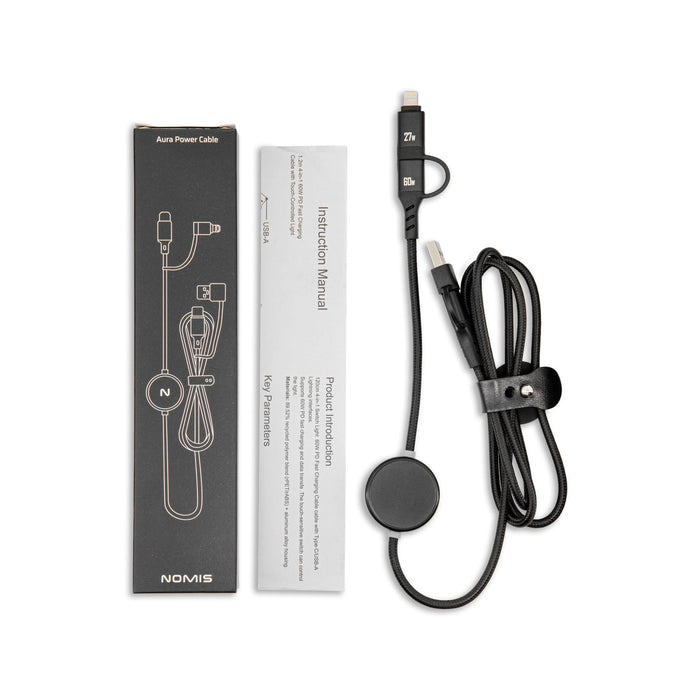 The Modern Essential Gift Set - A power cable with a round connector, along with an instruction manual, set against cardboard packaging.