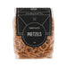 The Big Indulge - A clear bag of crunchy and salted pretzels in a brown and black packaging, featuring a logo.
