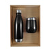 Pura Cardboard Gift Set - A drink bottle and a tumbler presented in a cardboard gift set, both featuring a sleek black design with silver accents.