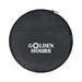 The Escape Pack - A round black zippered pouch with a logo and text on the front. The material appears durable and lightweight.