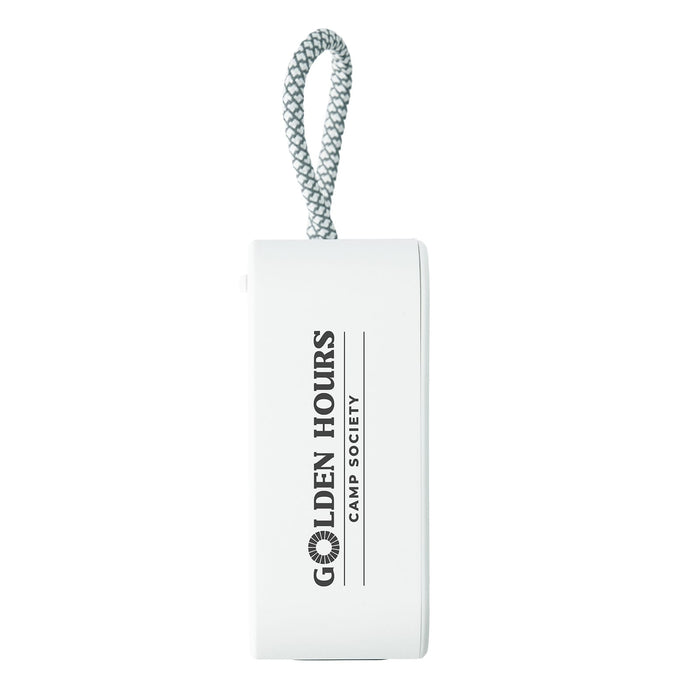 The Escape Pack - A white portable device with a grey strap, featuring a logo and text.