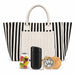 The Good Stuff Pack - A striped tote bag with a white pocket, containing a black drink bottle, a jar of colourful sweets, and a wooden keychain.