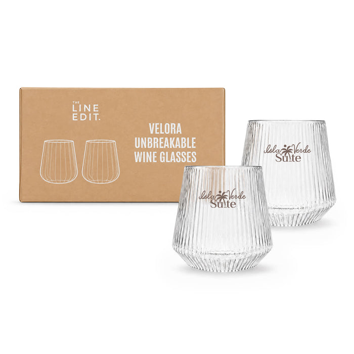The Sun & Sip Gift Set - A box containing two clear, unbreakable wine glasses with a ribbed design. The box features a logo.