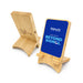 Oscar Illuminating Charging Stand - A bamboo phone stand with a blue logo and promotional text for the 2026 Expo, featuring a sturdy design.