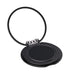 Tech Pack Essential - A black phone grip and stand with a circular, hinged design. It features a shiny finish and a branding logo.