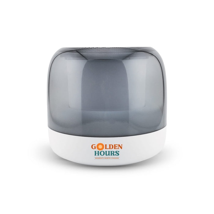 Dazzle RGB Speaker - A compact grey and white speaker featuring a rounded design and a logo on the front.