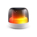 Dazzle RGB Speaker - A Dazzle RGB Speaker with a glossy black and white exterior, featuring vibrant warm orange and yellow lighting.