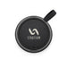 Empire Maglock Ph Stand Speaker - A black circular speaker with a textured edge and a strap, featuring a simple logo in the centre.