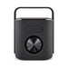 Hudson Bluetooth Speaker - A black Hudson Bluetooth speaker with a circular control knob and a carry handle on top. It features a sleek design.