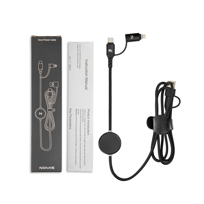 Aura by Nomis Cable - A power cable in black with an instruction manual and packaging, featuring a circular cable holder.