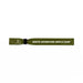 Event Wrist Band - A green wristband with a logo and text detailing an adventure hiking and camping theme.