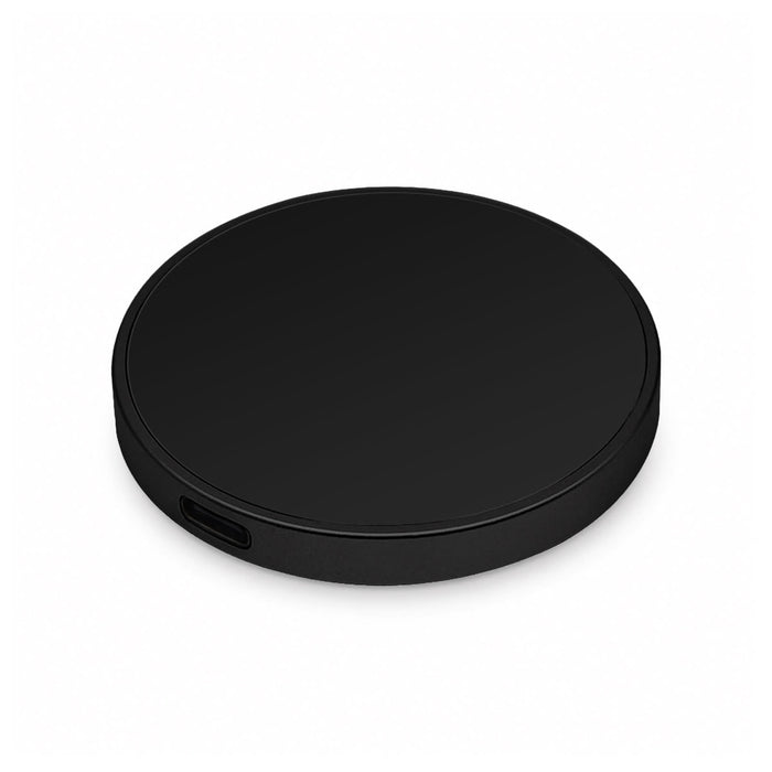 Puck Magnetic Phone and Watch Charger with Stand - A round black magnetic charger with a USB-C port. It features a sleek, minimalist design.