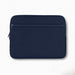 Mate Neoprene Laptop Sleeve 16 inch - A navy neoprene laptop sleeve designed for a 16-inch laptop, featuring a zippered pocket and a subtle logo.