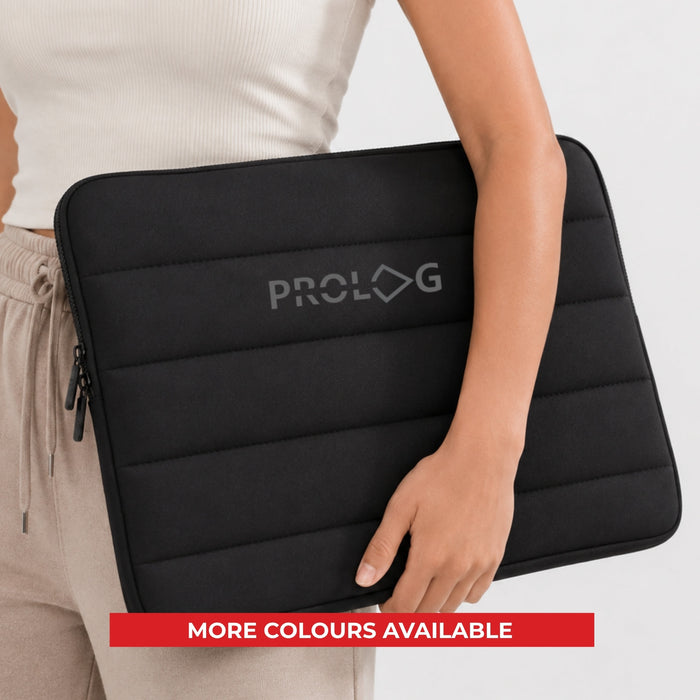 Bubble Neoprene Laptop Sleeve 16 inch - A black neoprene laptop sleeve, featuring a padded design and a logo, held by a person. More colours available.