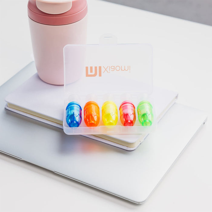 Mackie Highlighter Sets - A set of five highlighters in blue, yellow, green, and orange, packaged in a clear case with branding.