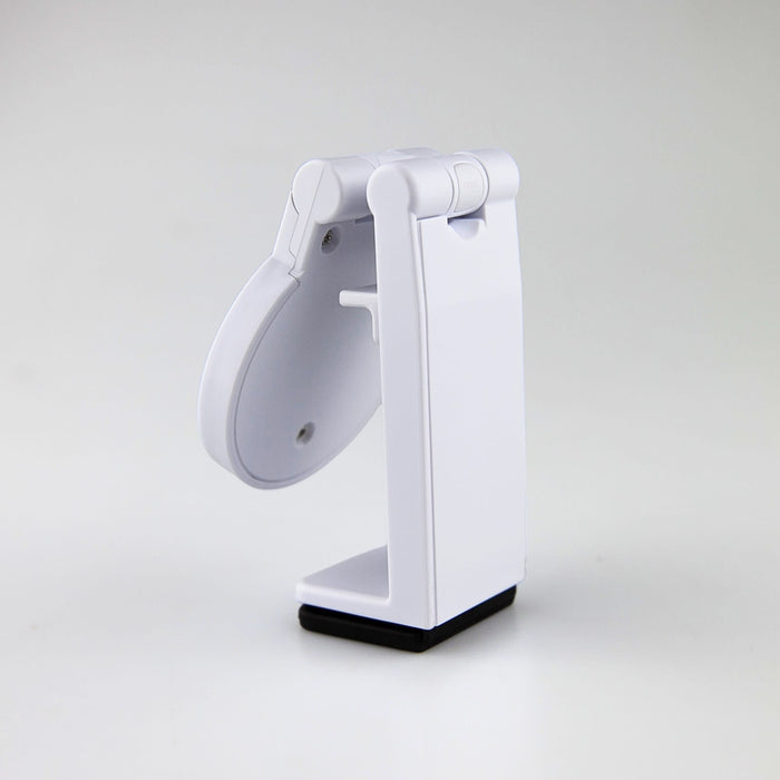 Traveler Mobile Phone Stand - A white mobile phone stand with a foldable design and a black base. It features a simple, modern look.