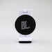 Traveler Mobile Phone Stand - A white mobile phone stand with a black circular base featuring a logo. The design is sleek and modern.