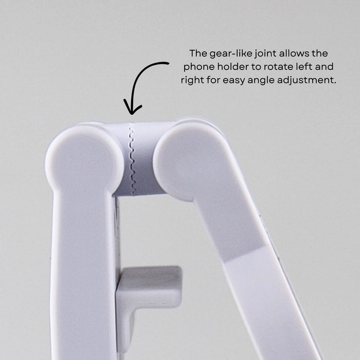 Traveler Mobile Phone Stand - A white mobile phone stand with a adjustable joint for angle rotation. The product features a simple, minimalist design.