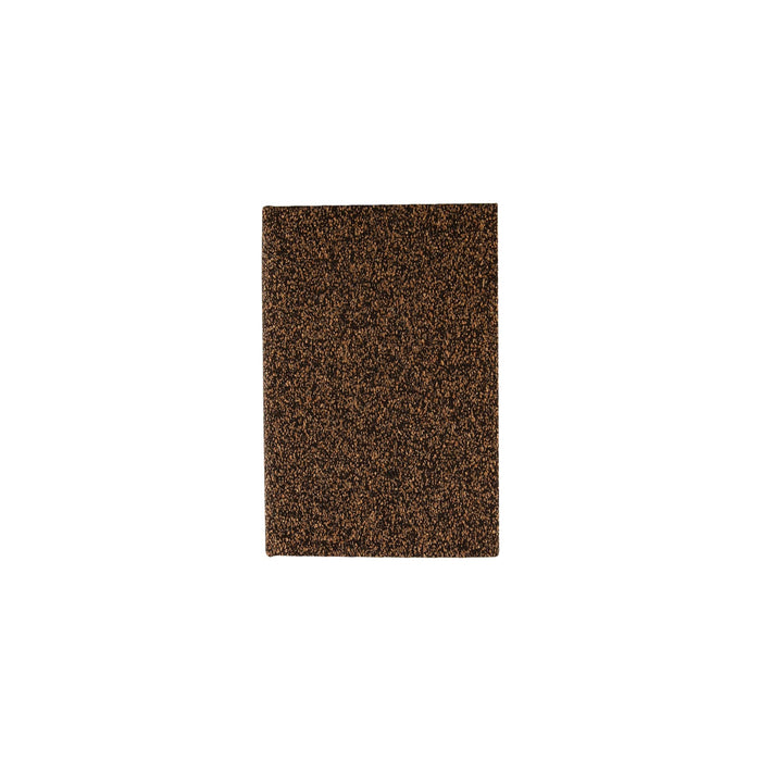 Coffee Grounds A6 Notebook - A brown notebook with a textured cover resembling coffee grounds. It features a logo on the front.