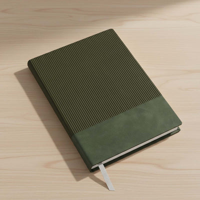 Murica Notebook B5 - A black B5 notebook with a ribbed cover, resting on a wooden desk, featuring a ribbon bookmark.