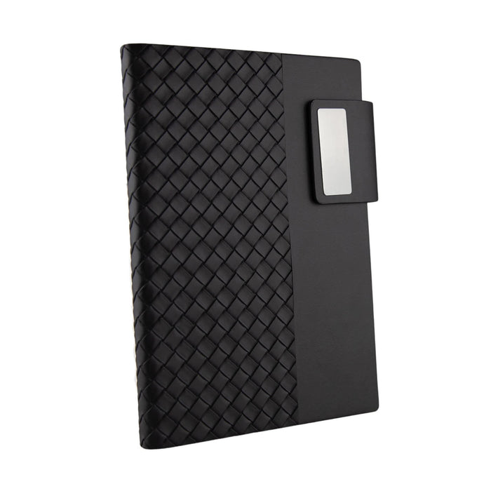 Nexus Notebook - A black notebook with a textured woven design and a silver clip on the side. It features branding on the cover.