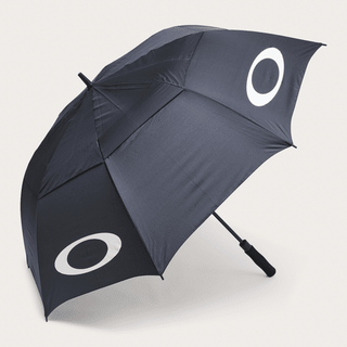 Oakley Turbine Umbrella - A black umbrella featuring a prominent logo and a sturdy handle, designed for outdoor leisure use.