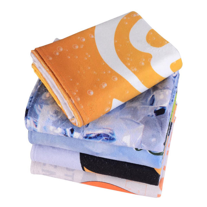 Bath Sheet - A stack of five colourful face washers in shades of orange, blue, and various patterns, featuring a logo.