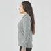 Women's Nevada L/S Micro Pique Polo - A women's long-sleeve micro pique polo in grey, featuring a collar and a fitted design.