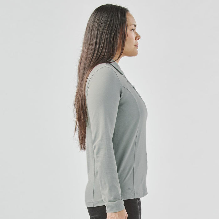 Women's Nevada L/S Micro Pique Polo - A women's long-sleeve polo shirt in grey, featuring a collar and a fitted design, with a visible logo.