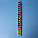 30cm Popper Ruler - A 30cm popper ruler featuring a vibrant design with blue and multicoloured dots, alongside a logo.