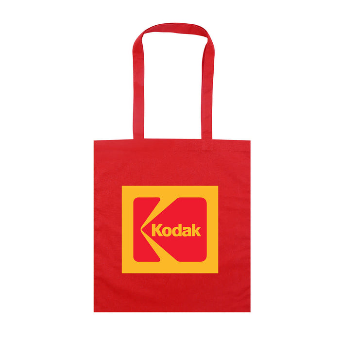 Colourful Calico Tote Bag - A red tote bag featuring a large yellow square with a logo, including a prominent 'K' design.