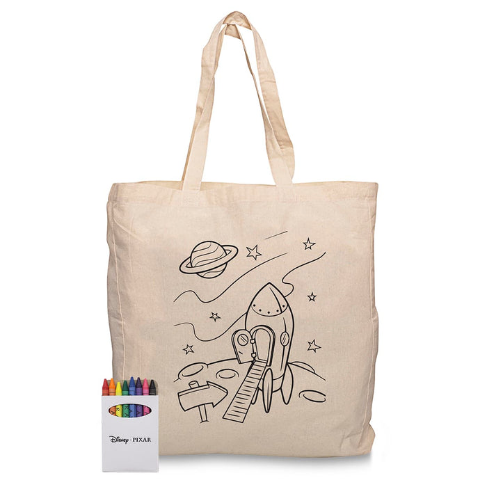 Squiggle Calico bag + Crayon set - A beige cotton tote bag featuring a rocket and space design, accompanied by a set of crayons in various colours.